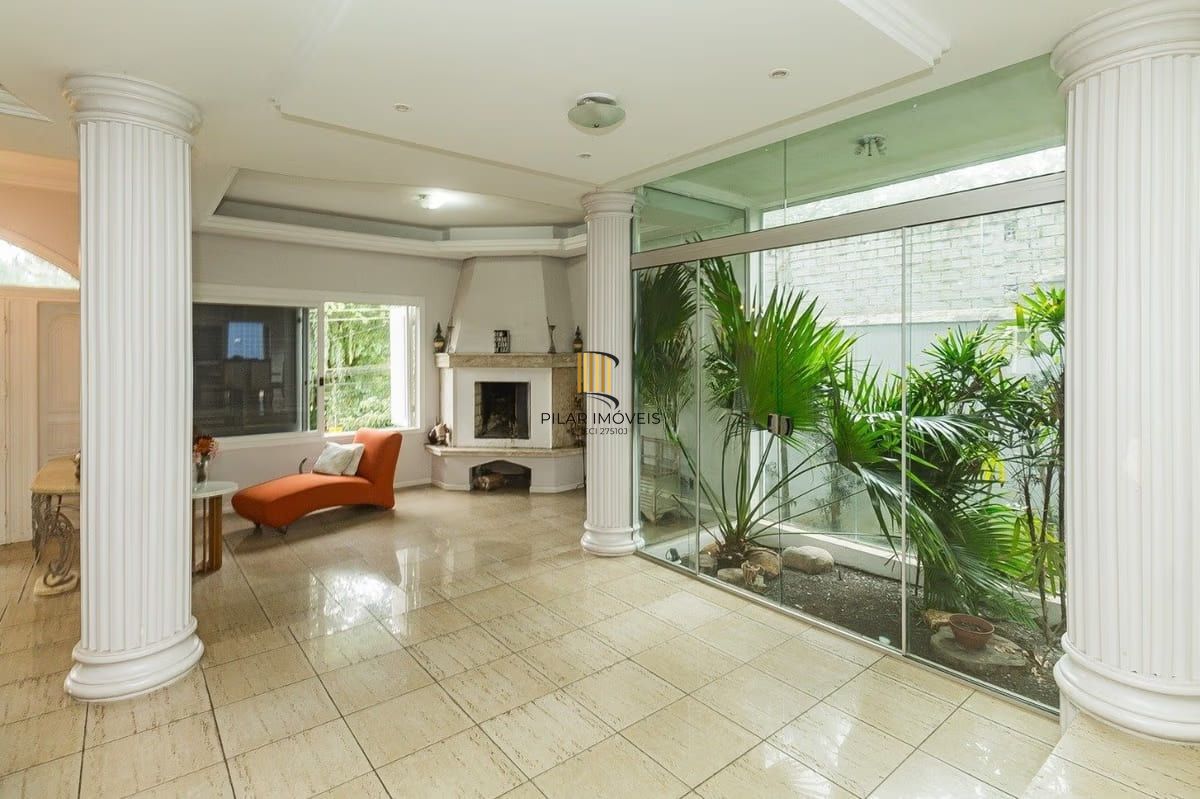 Casa com 5 dormitórios à venda em Parque Santa Fé, Porto Alegre. - Pilar Imóveis