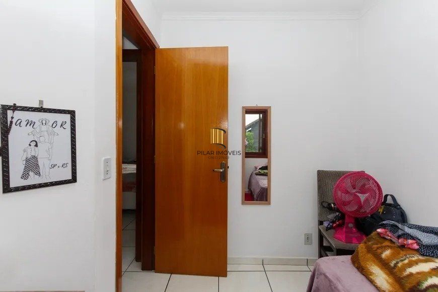 Casa em condomínio com 3 dormitórios, 1 vaga no bairro Nossa Senhora das Graças, Canoas!