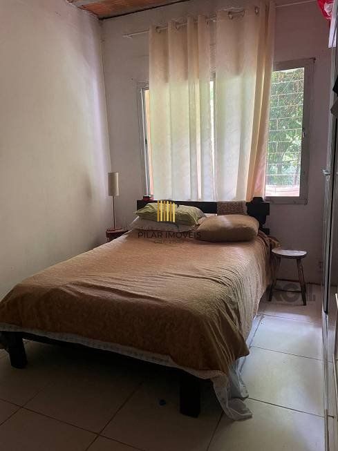 Casa 94m² - 2 dormitórios, 1 vaga no bairro Jardim Botânico