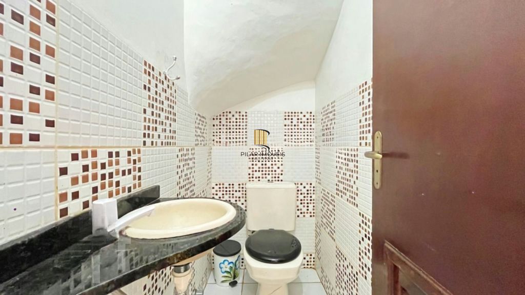 Casa de 2 dormitórios à venda Rua Heitor Kramer, Guarujá - Porto Alegre