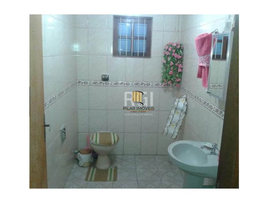 Casa para Venda - 634m², 2 dormitórios, sendo 1 suites, 3 vagas - Lomba do Pinheiro