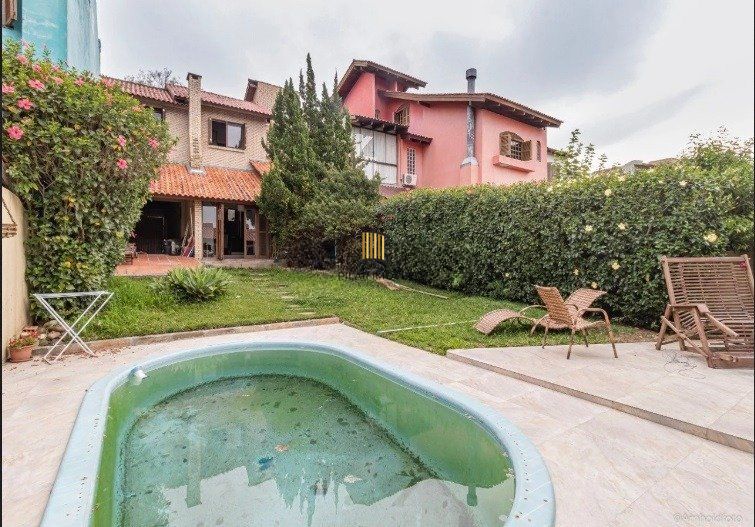 Casa de 3 dormitórios à venda em Ipanema, Porto Alegre.