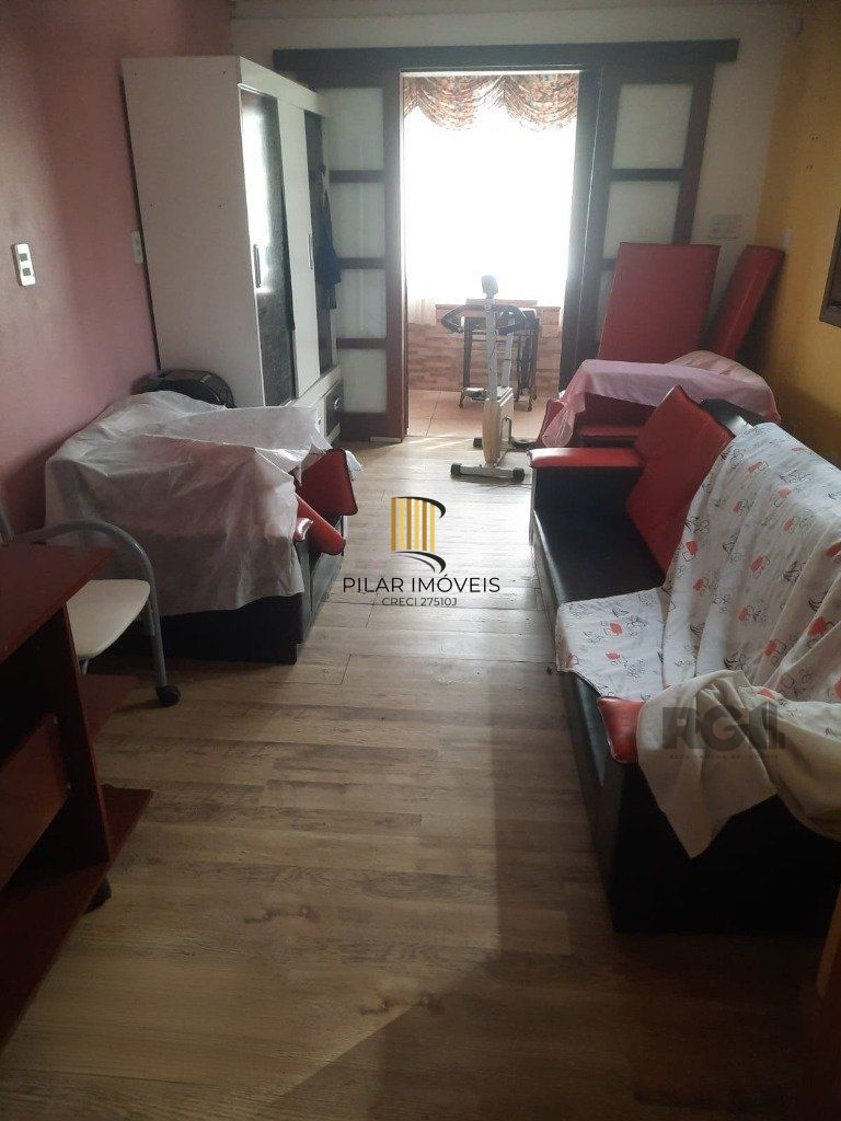 Casa de 4 quartos com 243,58m² no Bairro Lomba do Pinheiro