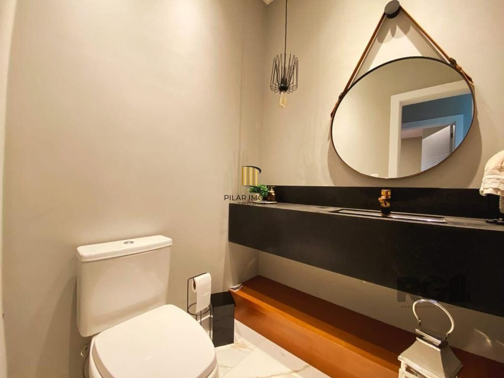 Casa de Condomínio 5 dormitórios no bairro Atlântida Sul
