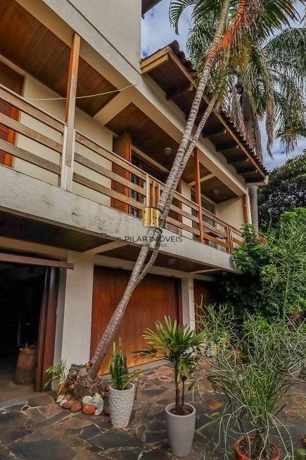Casa 470m² - 4 dormitórios, 5 vagas no bairro Jardim São Pedro