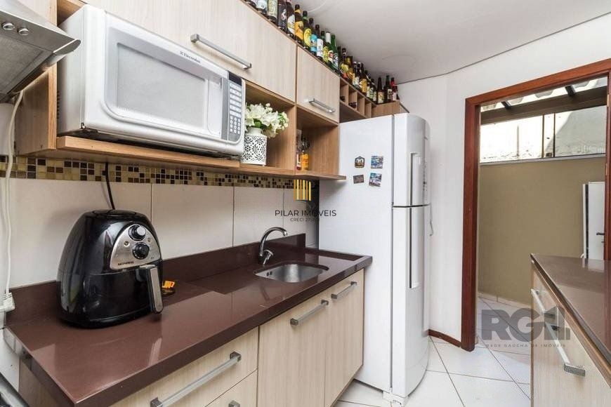 Casa em condomínio de 84m² - 2 dormitórios, 1 suíte e 1 vaga no bairro Ipanema