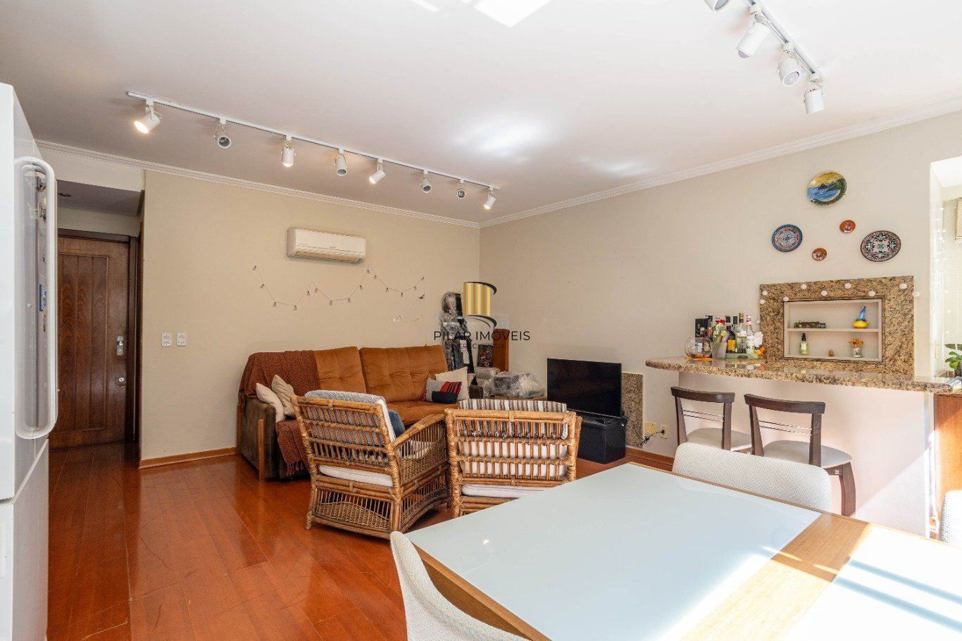 Apartamento de 3 quartos e 93m² à venda em Rio Branco, Porto Alegre.