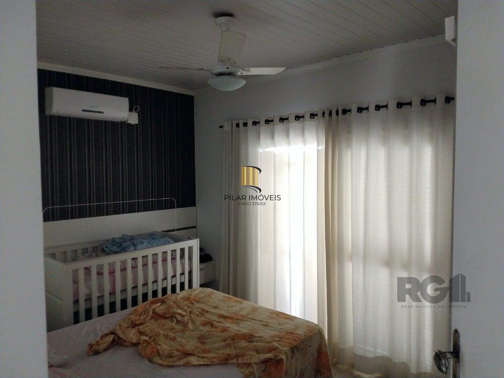 Casa com 3 dormitórios no bairro Ipanema