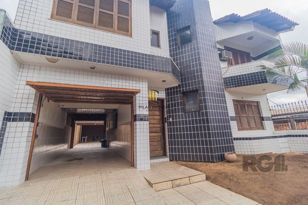 Casa com 240m², 3 dormitórios, 6 vagas no bairro Sarandi - Pilar Imóveis