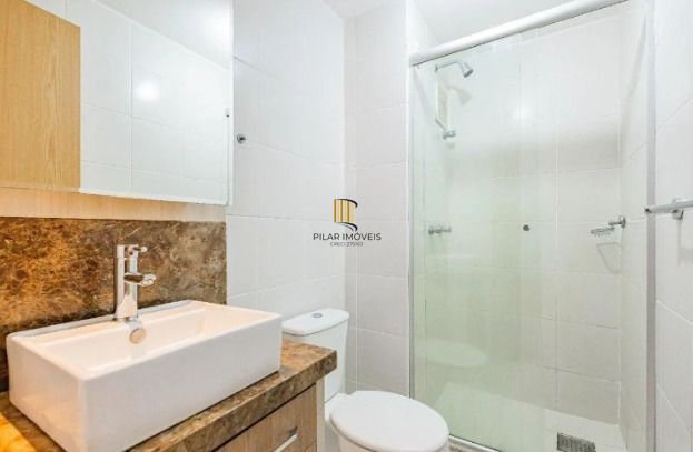 Apartamento 2 dormitórios com 1 suíte no bairro Passo D'areia em Porto Alegre.