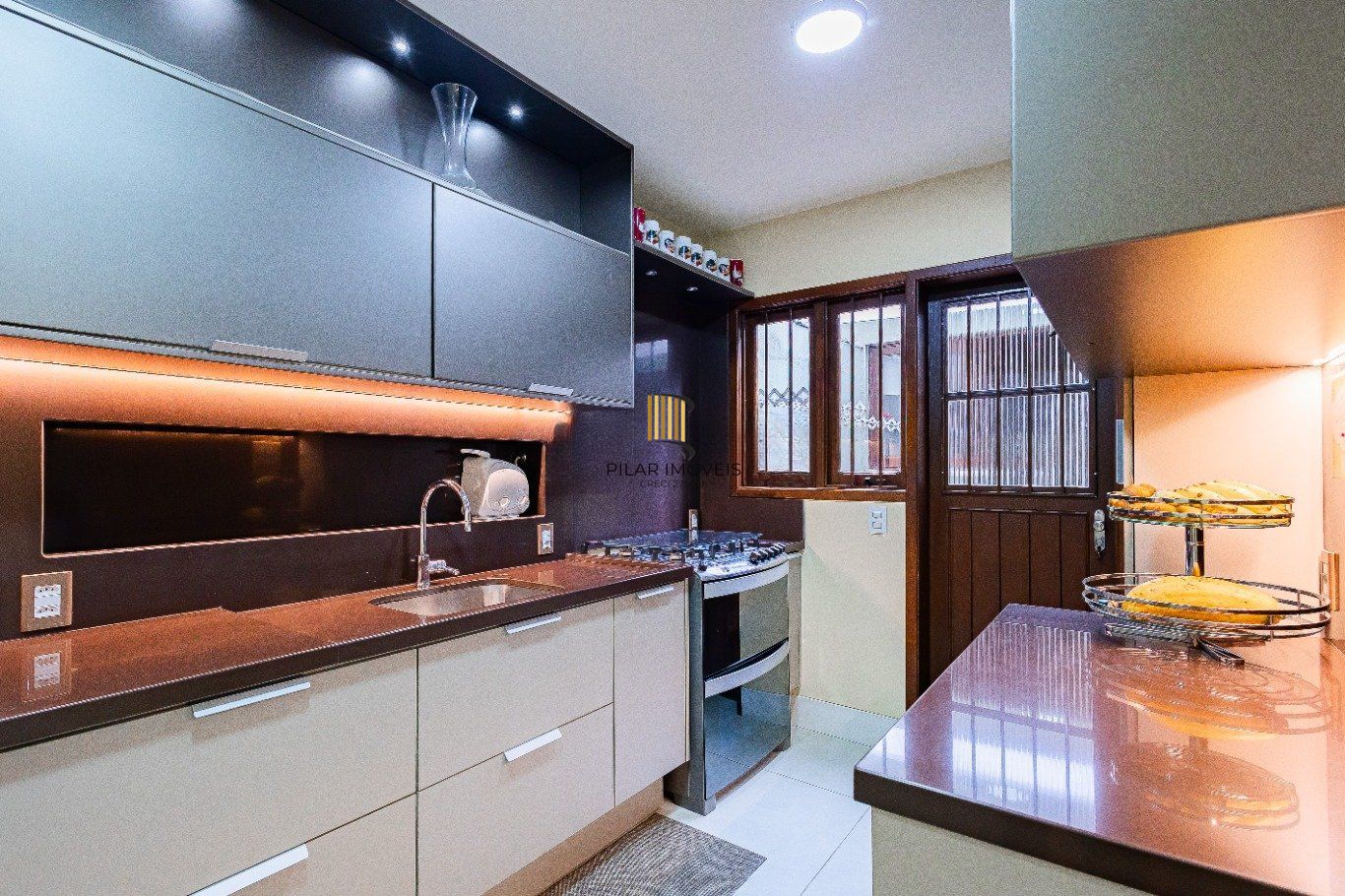 Casa de 4 dormitórios e 208m² à venda no Bairro Jardim Botânico, Porto Alegre.