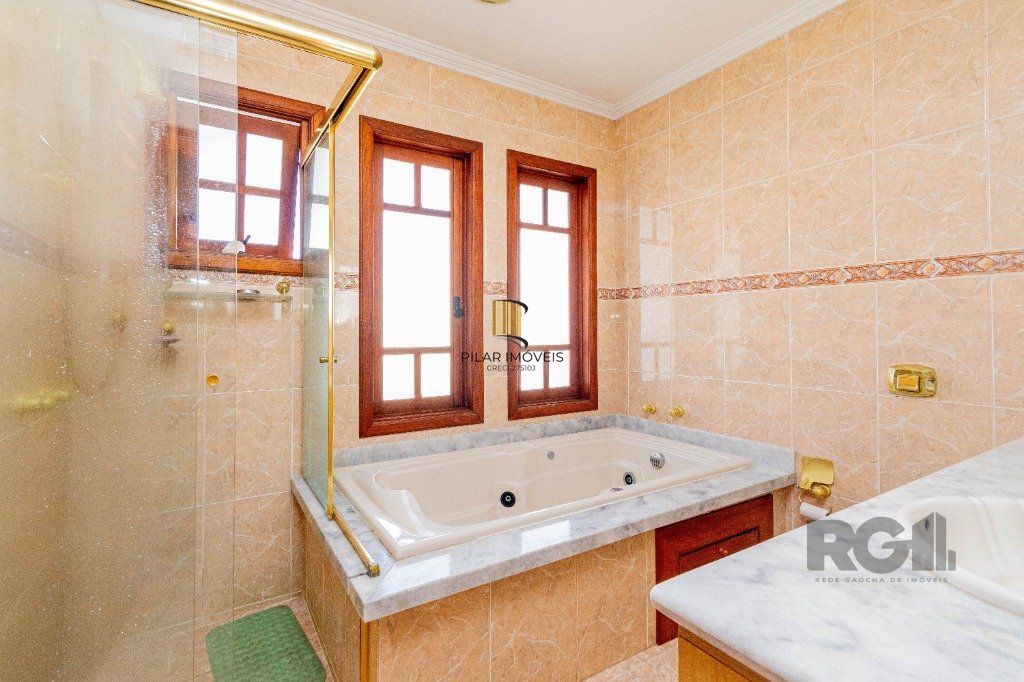 Casa de 4 dormitórios 304m² no bairro Jardim Lindóia