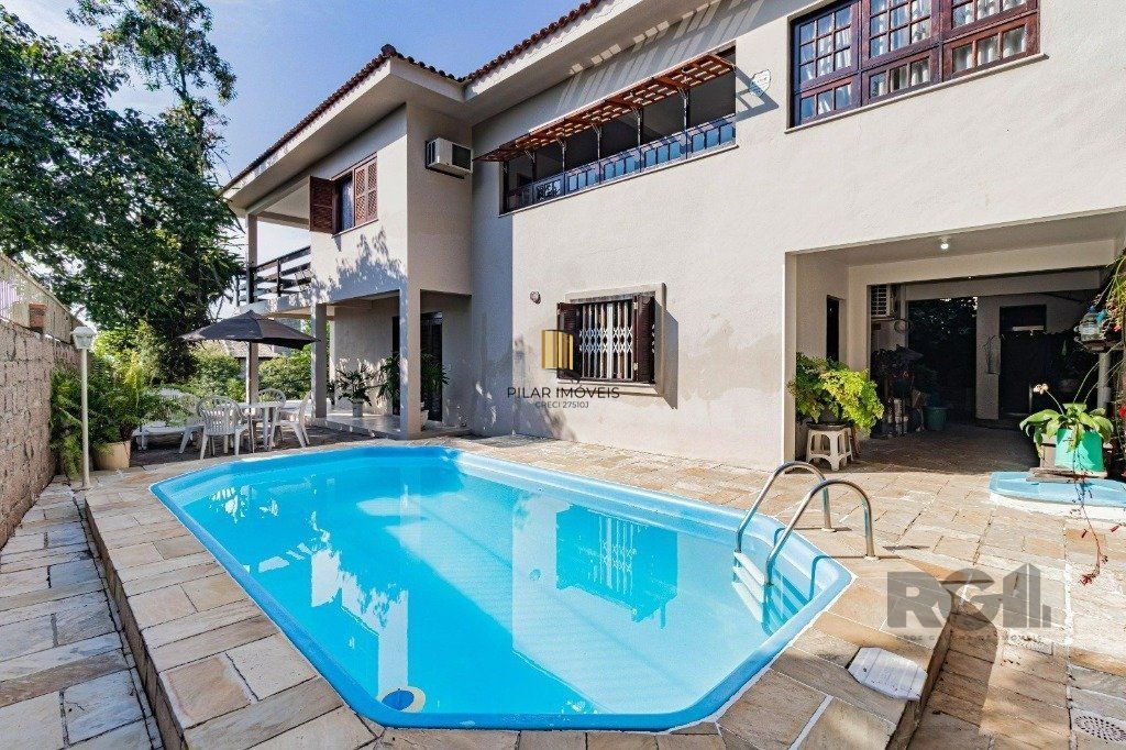 Casa com 267m², 3 dormitórios, 1 vaga no bairro Tristeza