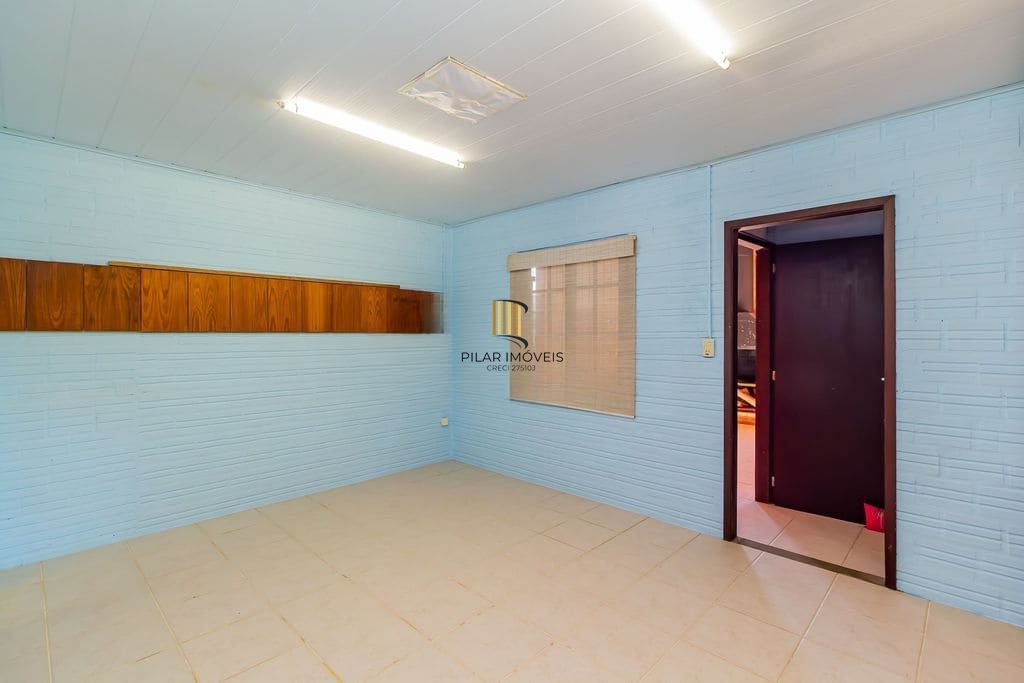 Casa de 3 dormitórios, no Bairro Ponta Grossa - Porto Alegre