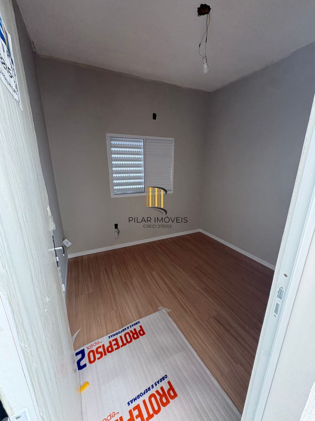 Casa de 2 dormitórios no bairro Lomba Do Pinheiro - Porto Alegre