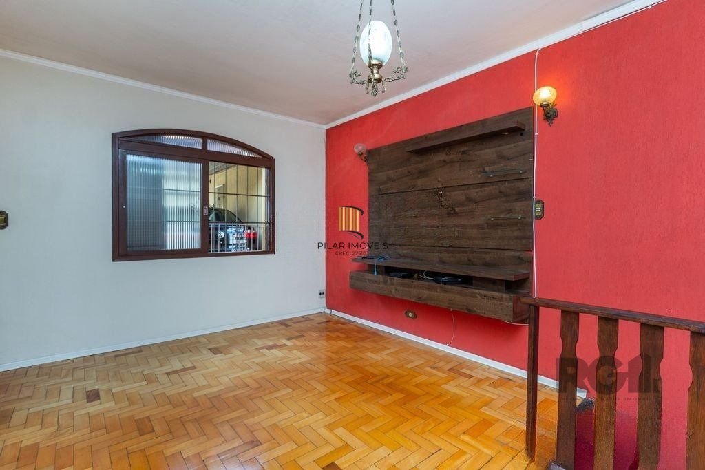 Casa de 4 dormitórios no bairro Camaquã