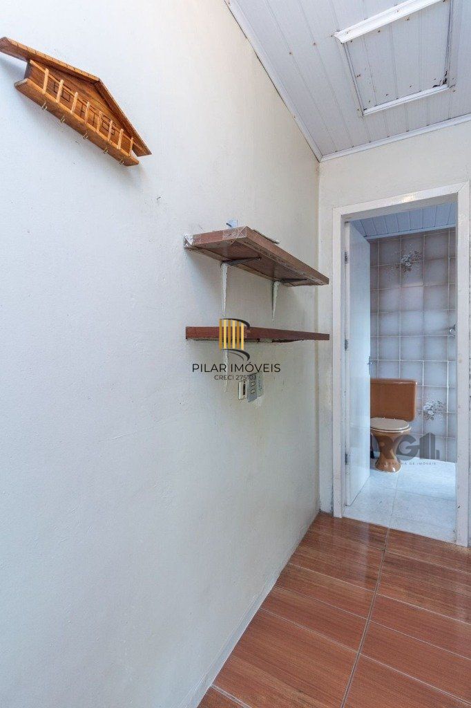 Casa de 4 dormitórios no bairro Camaquã