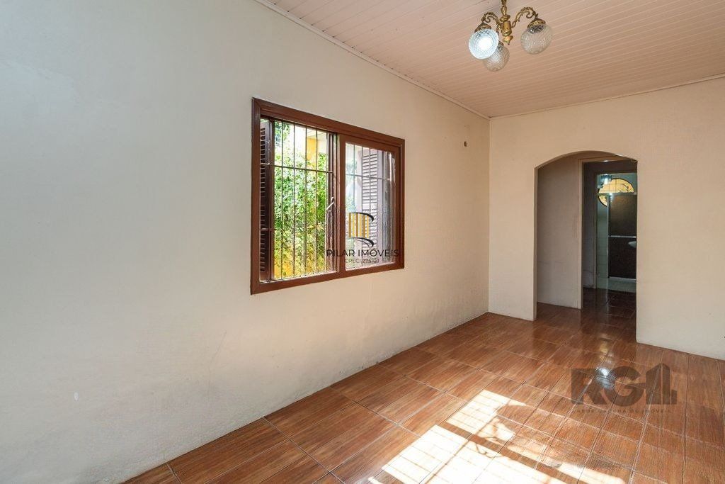Casa de 4 dormitórios no bairro Camaquã