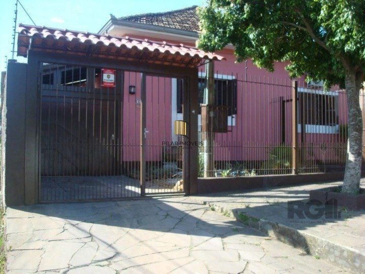 Casa 4 dormitórios no bairro Nonoai - Pilar Imóveis