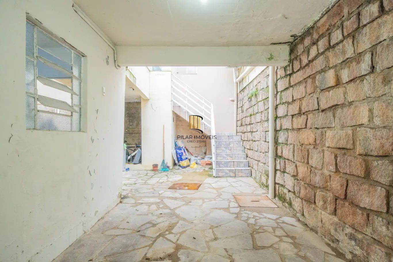 Casa de 3 dormitórios à venda em Santa Tereza, Porto Alegre.