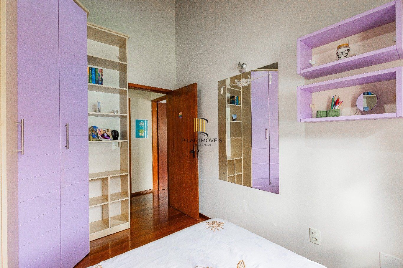 Casa de 4 dormitórios e 208m² à venda no Bairro Jardim Botânico, Porto Alegre.