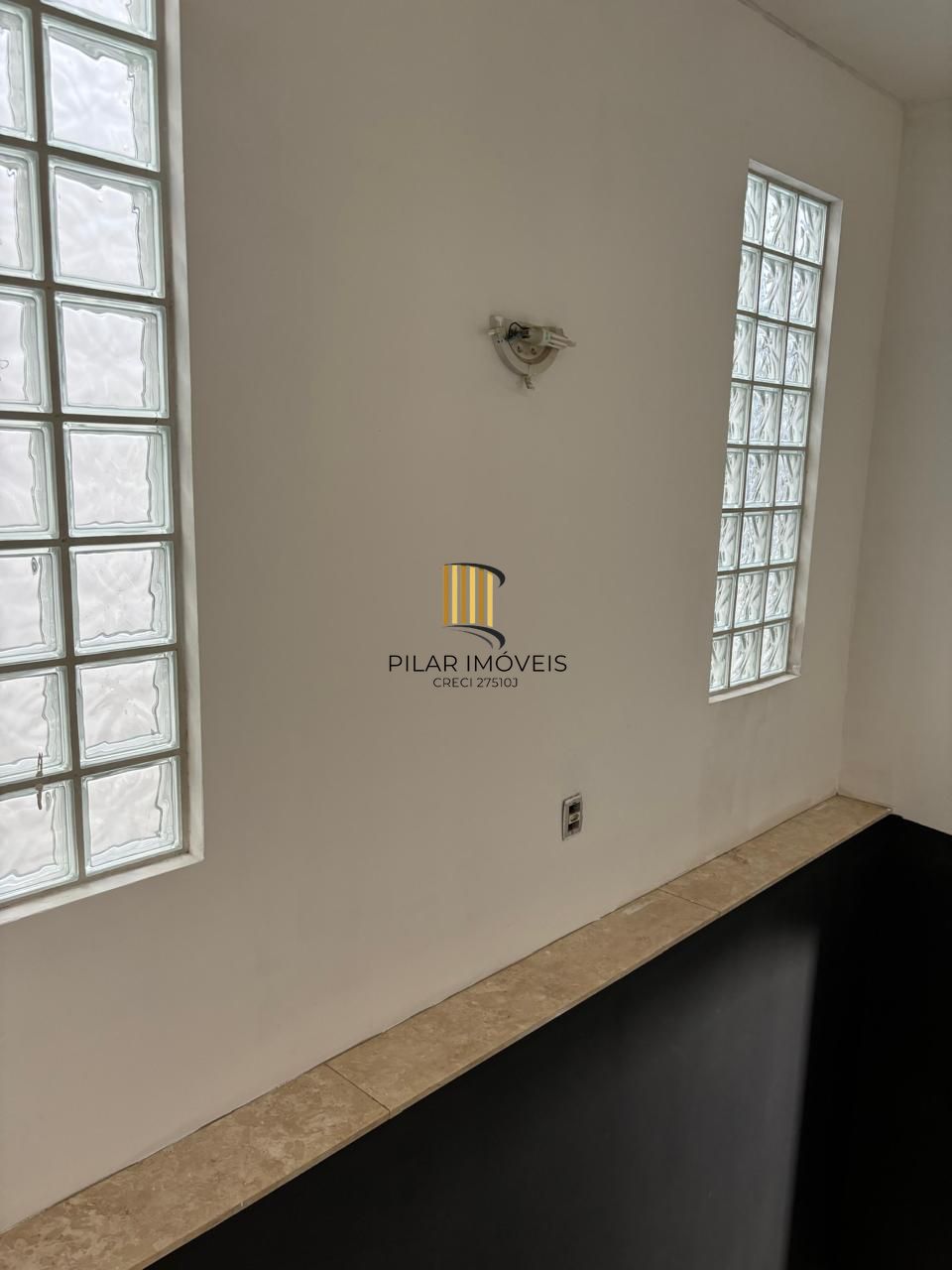 Sobrado 4 dormitórios no Menino Deus