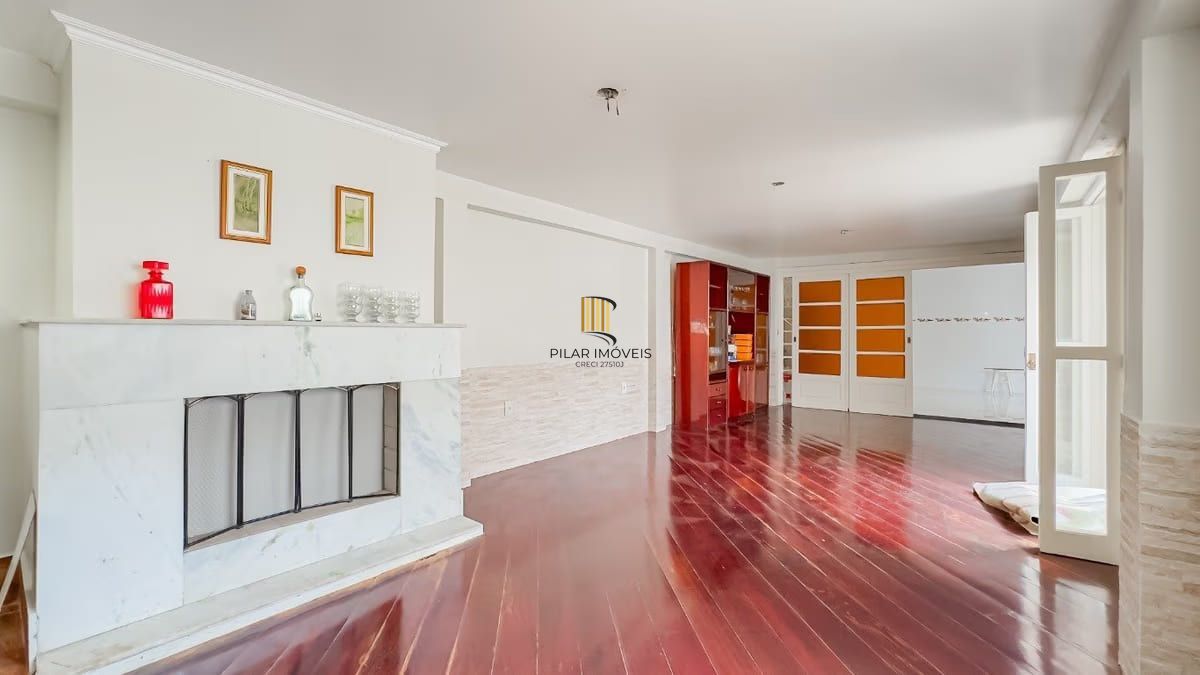 Sobrado de 3 dormitórios e 91m² à venda em Parque Santa Fé, Porto Alegre.