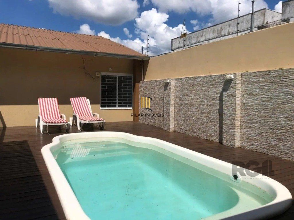 Casa com 3 dormitórios no bairro Rubem Berta - Pilar Imóveis
