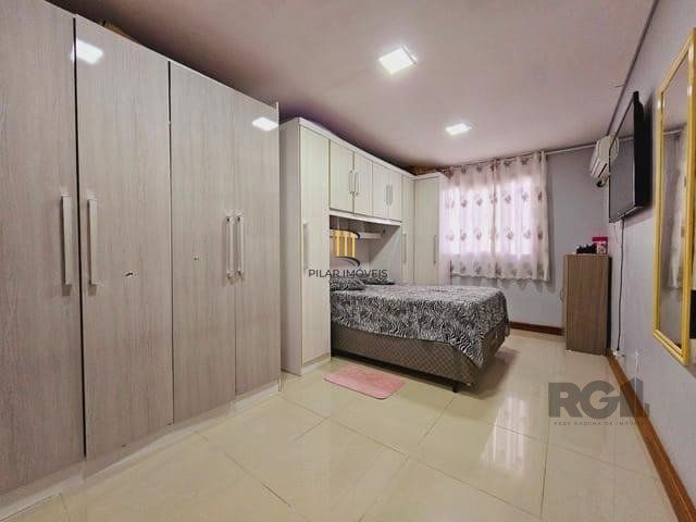 casa de 2 dormitorios, no bairro Mário Quintana