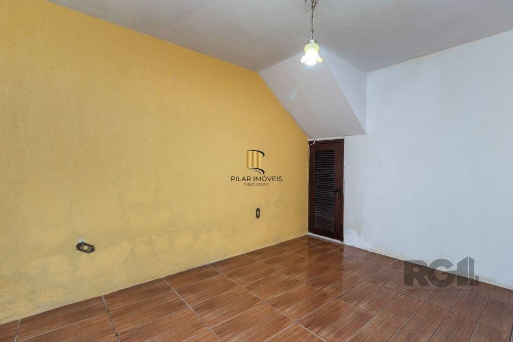 Casa de 4 dormitórios no bairro Camaquã
