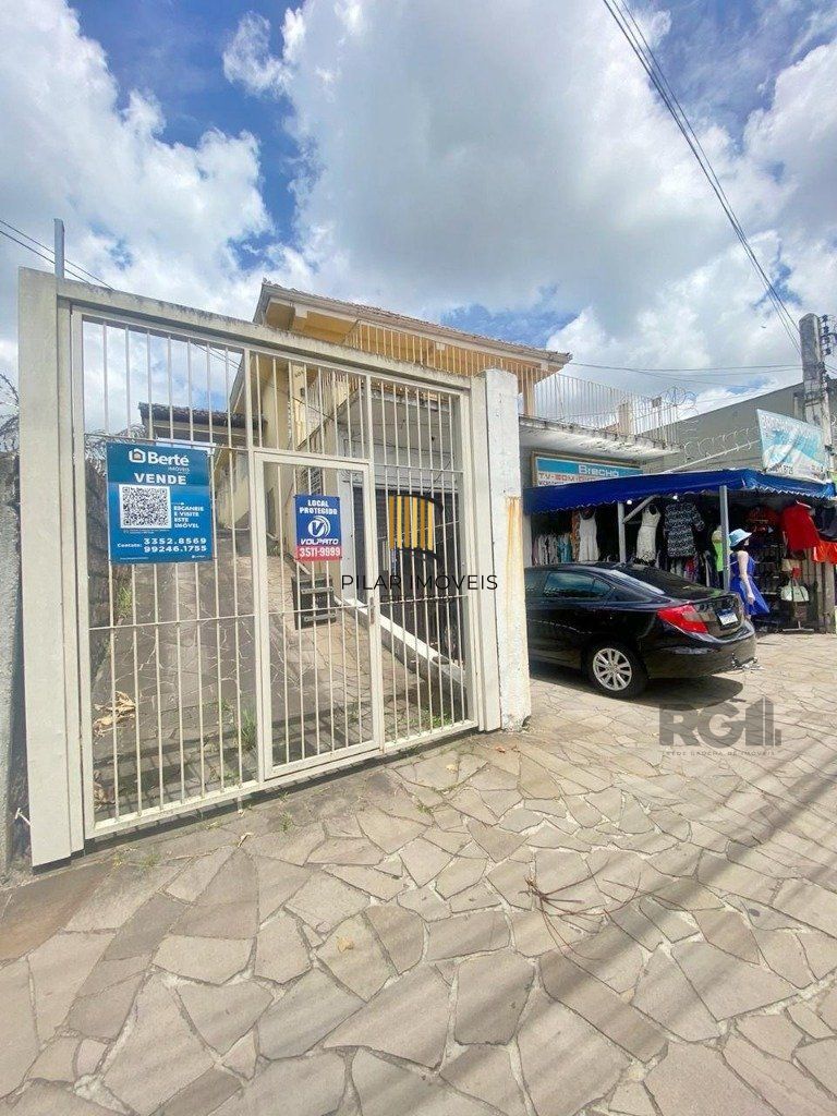 Casa 4 dormitórios no bairro Nonoai