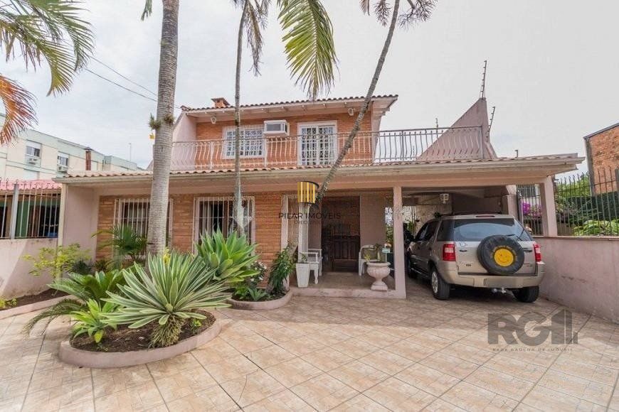 CASA PRÓXIMA AO PONTAL, com 5 vagas, 3 dormitórios!