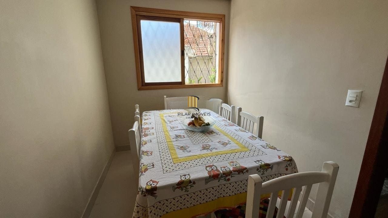 Casa de 4 dormitórios no bairro Santo Antônio, Porto Alegre