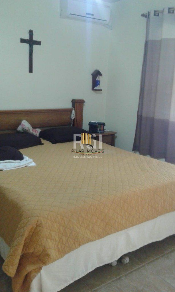 Casa 4 dormitórios no bairro Nonoai