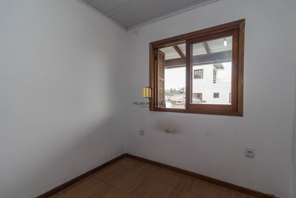 Casa de 6 dormitórios à venda Bairro Vila Nova - Porto Alegre