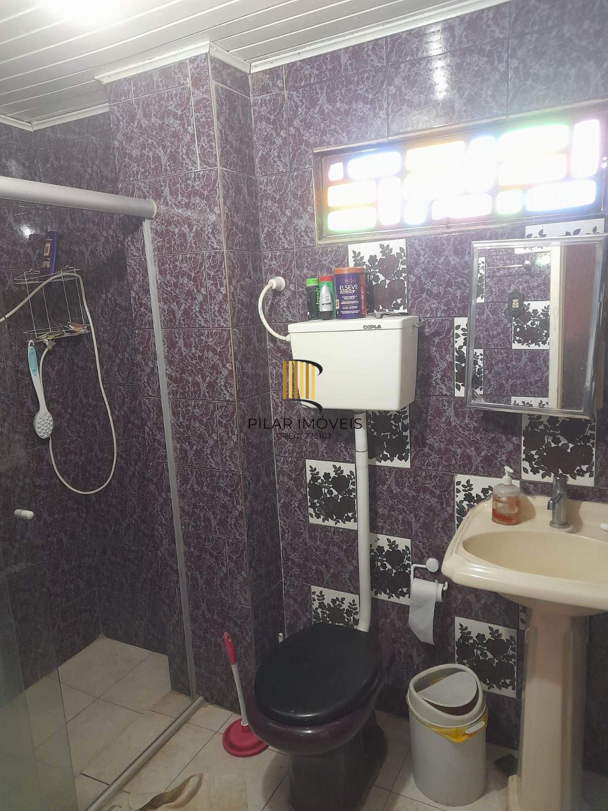 Casa à venda com piscina no bairro Glória, Zona Sul de Porto Alegre – 207m² construídos, pátio amplo e excelente potencial residencial