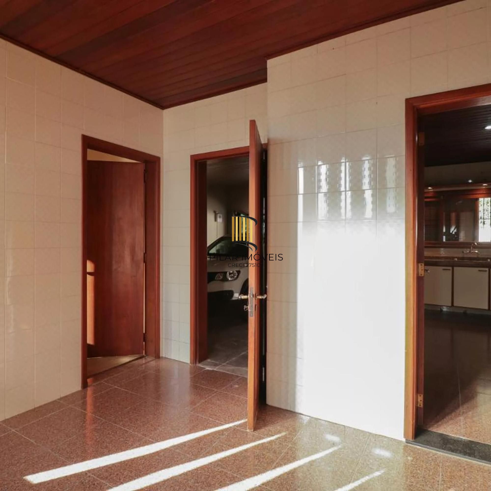 Casa à venda com 4 dormitorios no Bairro Nonoai - Porto Alegre