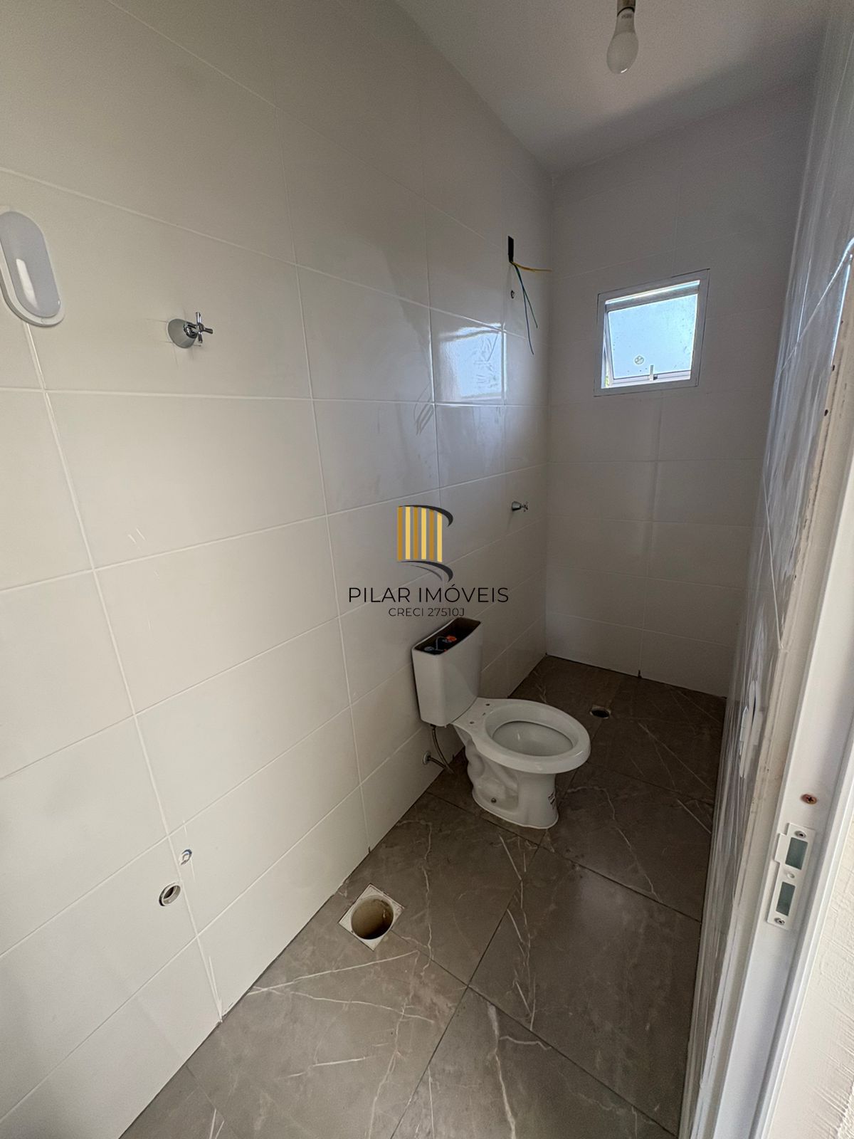 Casa de 2 dormitórios no bairro Lomba Do Pinheiro - Porto Alegre