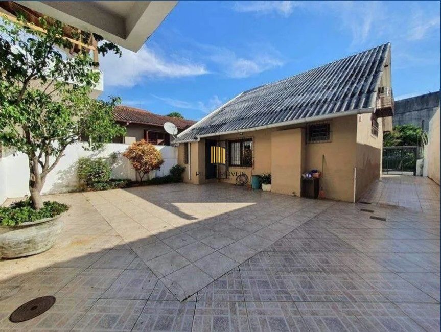 Casa 4 dormitórios no bairro Glória - Pilar Imóveis