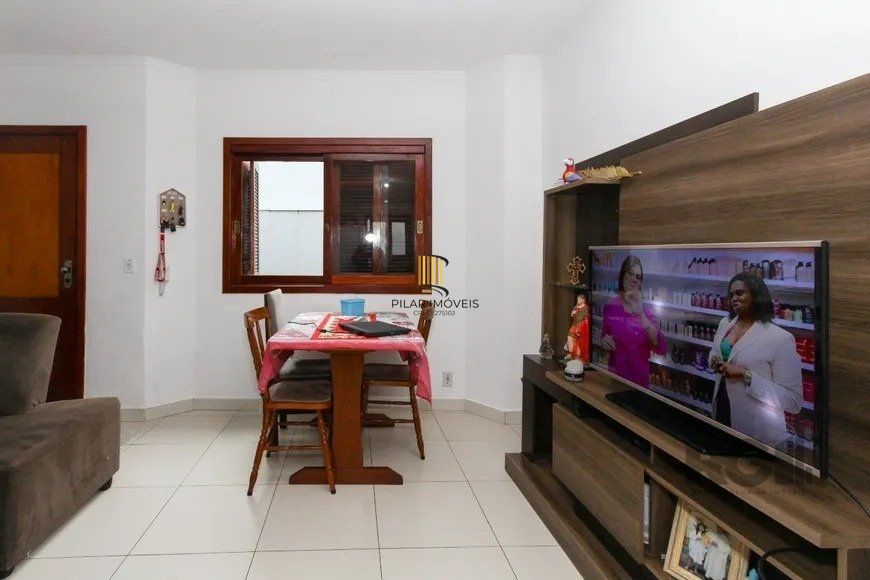 Casa em condomínio com 3 dormitórios, 1 vaga no bairro Nossa Senhora das Graças, Canoas!