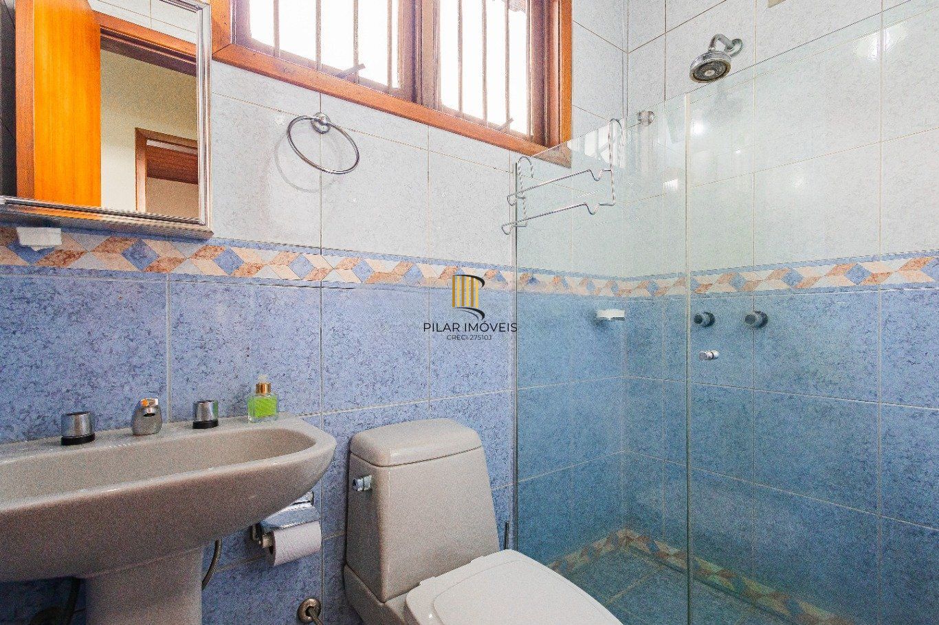 Casa de 4 dormitórios e 208m² à venda no Bairro Jardim Botânico, Porto Alegre.
