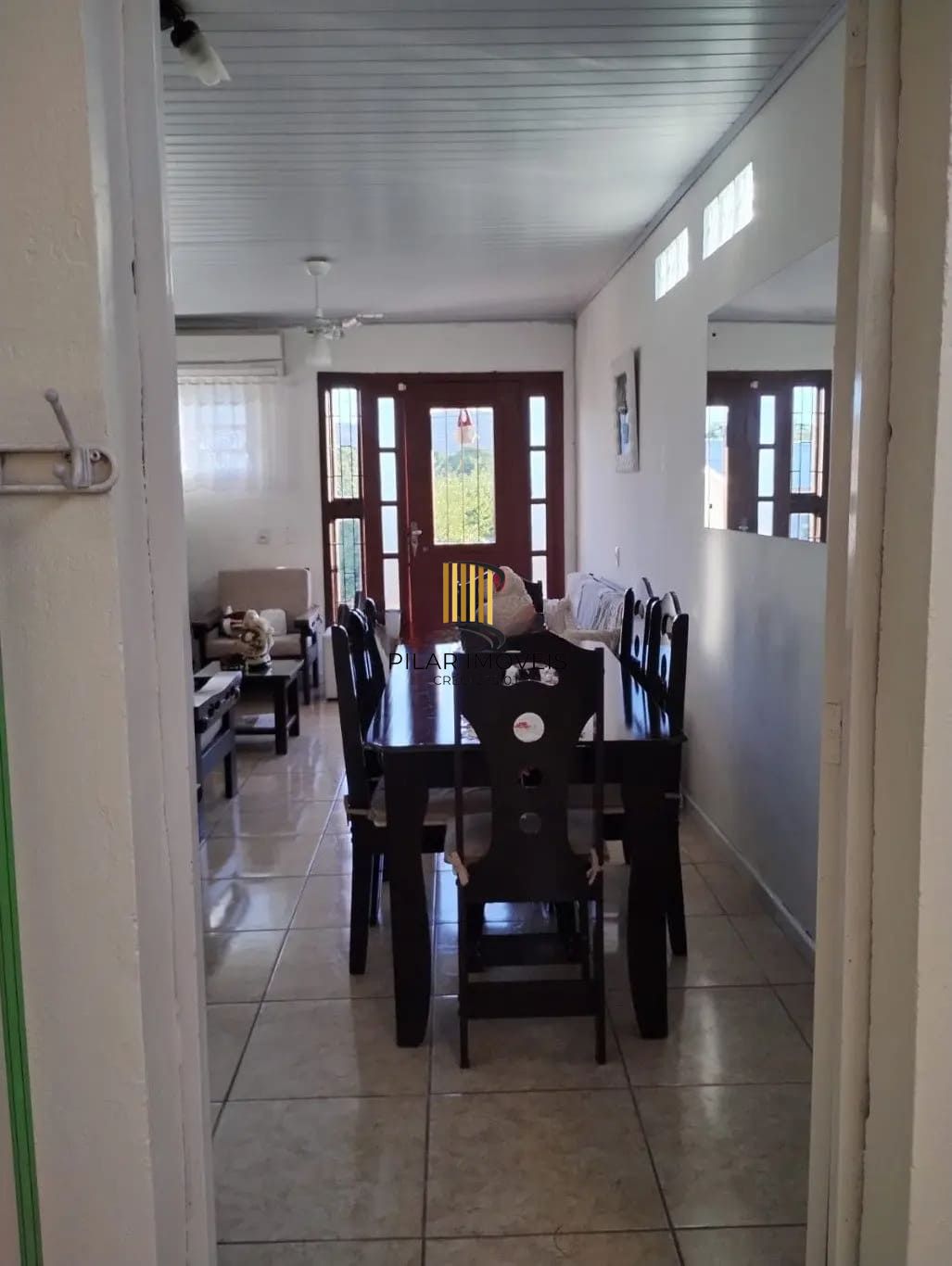 Casa de 3 dormitórios e 111m² à venda em Jardim Botânico, Porto Alegre.