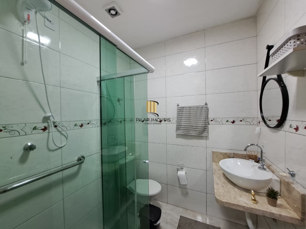 Casa com 04 dormitórios e piscina na praia de Imbé/ RS.