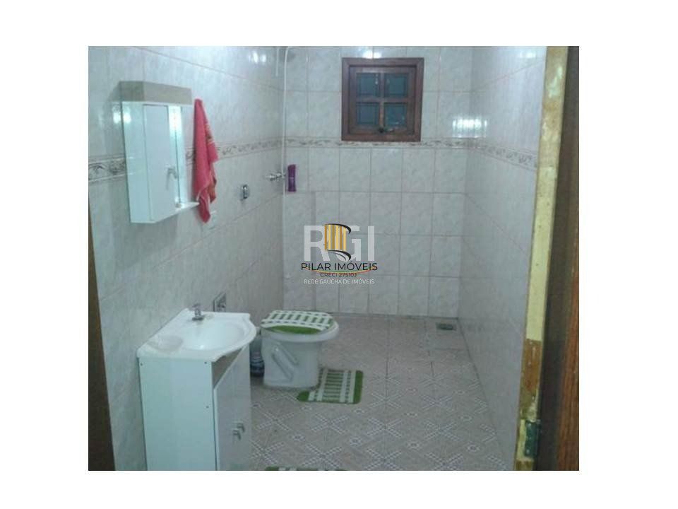 Casa para Venda - 634m², 2 dormitórios, sendo 1 suites, 3 vagas - Lomba do Pinheiro