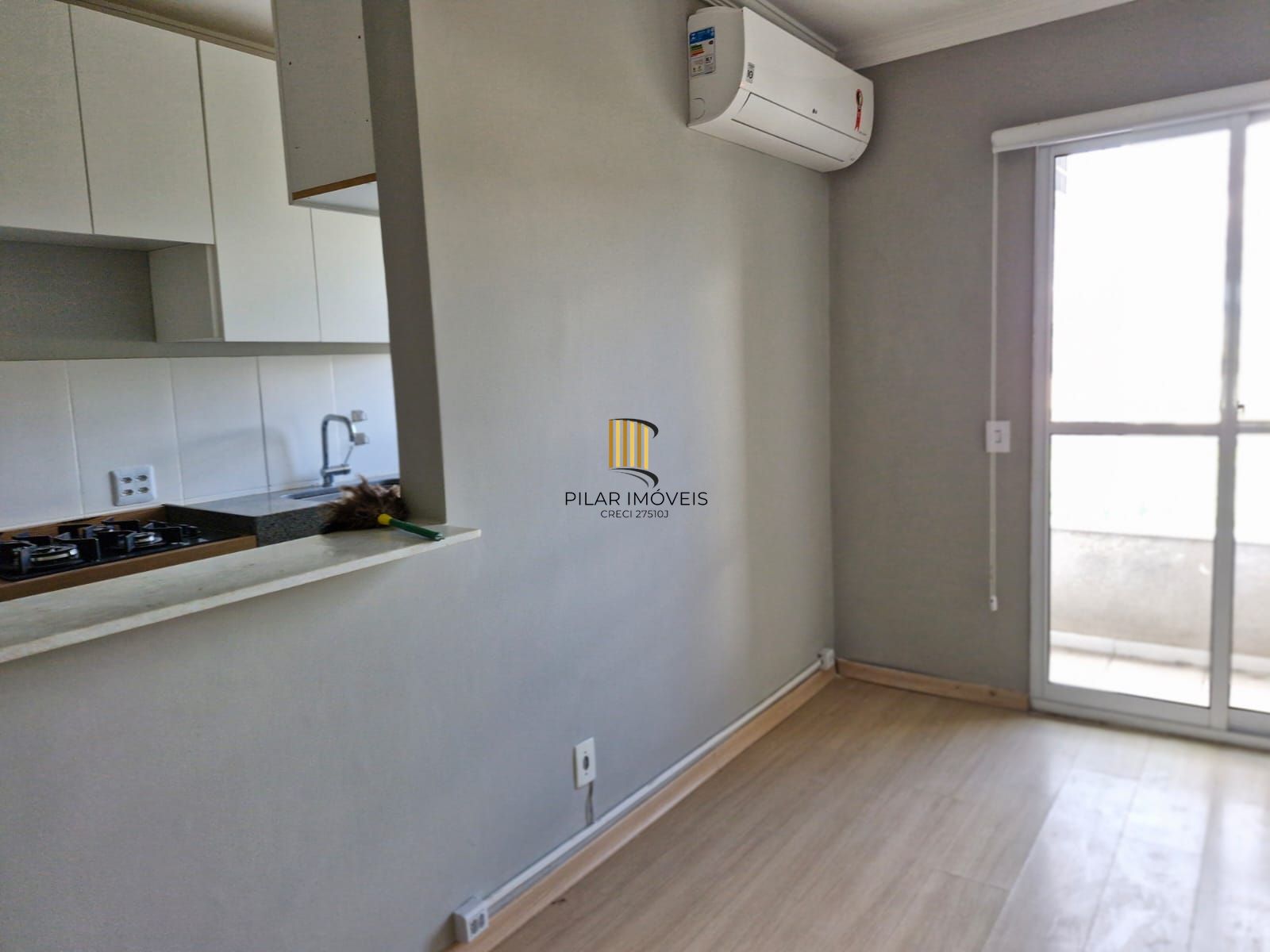 Apartamento de 2 dormitórios sendo 1 suíte, sala cozinha e garagem