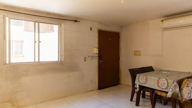 Apartamento de 2 dormitórios à venda no Bairro Partenon, Porto Alegre.
