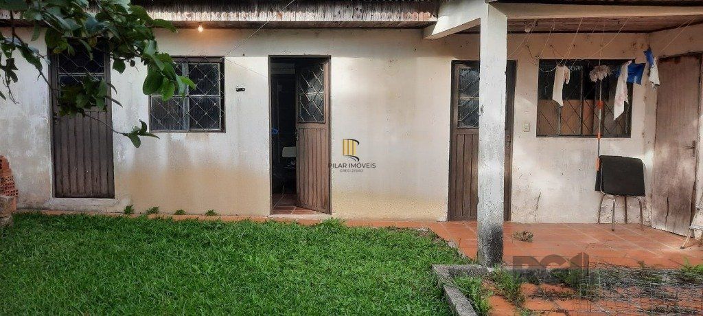 Casa de 4 quartos com 243,58m² no Bairro Lomba do Pinheiro