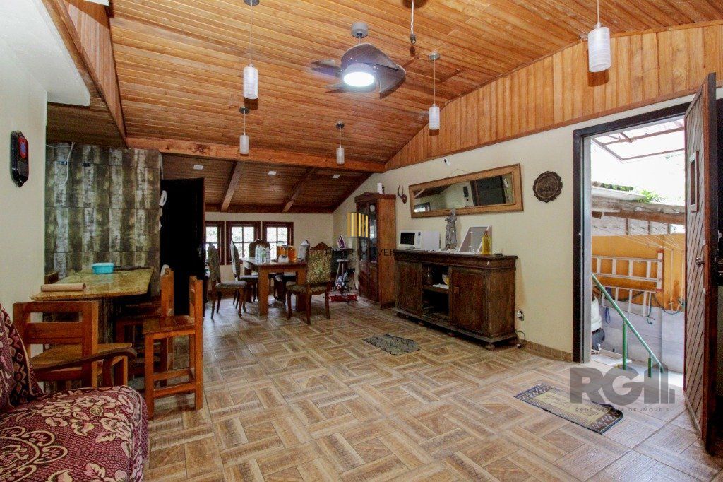Casa 5 dormitórios no bairro Nonoai - Pilar Imóveis