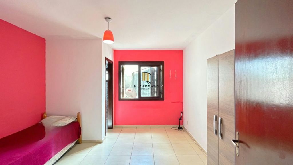 Casa de 2 dormitórios à venda Rua Heitor Kramer, Guarujá - Porto Alegre