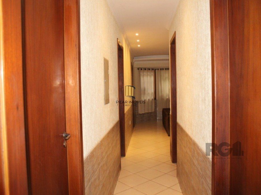 Casa 179m², 3 dormitórios, 3 vagas no bairro Parque Santa Fé